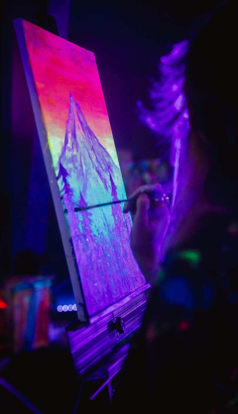 A partier painting a mountain